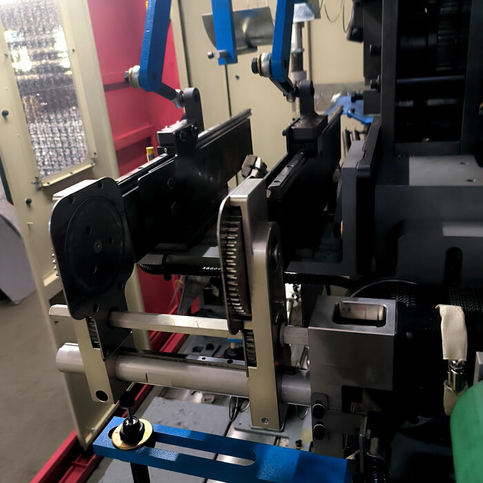 ความจุ 60-90 ใบ 8 ชั่วโมง สายการผลิตหมอนที่มีเส้นแหวนปลายสปริง กว้าง 65 มม-90 มม กว้างสายประกอบ 1.3-1.6 มม สําหรับการประกอบหมอน